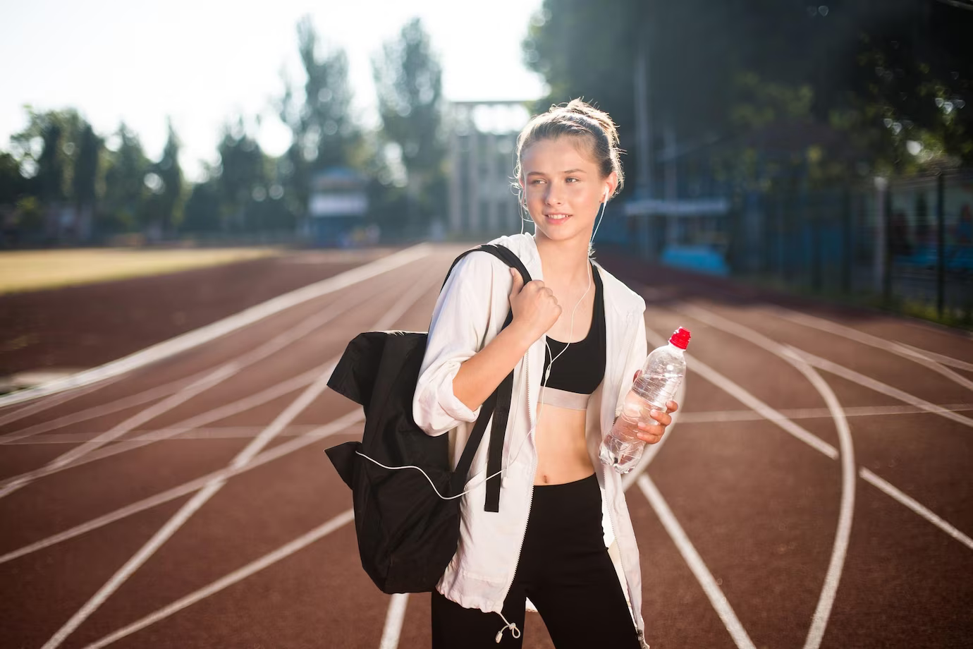 Student walking on track